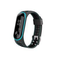 eses Silikónový remienok pre Xiaomi Mi Band 5 a Xiaomi Mi Band 6 - Čierny reliéf s modrým prešívaním